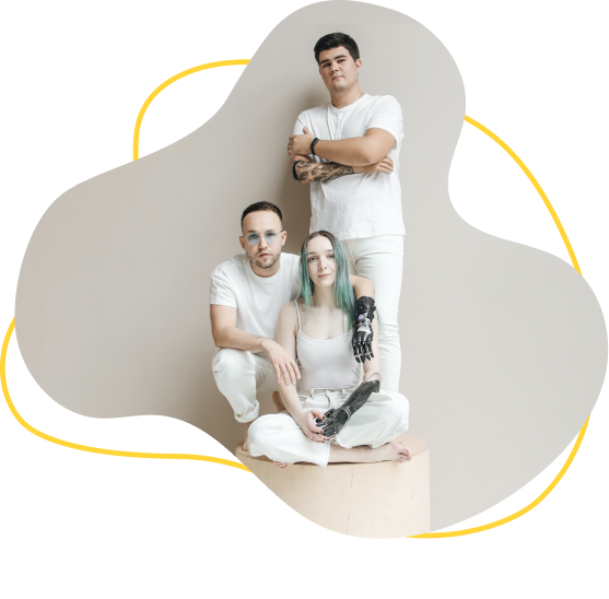A group of three people with prosthetic arms posing on a pedestal. The image is encased in an abstract swirl border that has a yellow line running through it