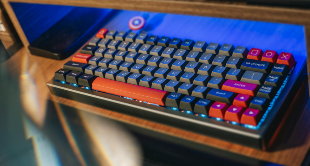 An ergonomic mechanical keyboard with colorful keycaps, designed for comfortable and efficient typing in a workspace setting